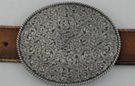 large oval pewter western buckle with floral scroll-work