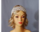 silver white cord crochet headband strung with cream, brown and coffee wooden beads on forehead, elastic in back